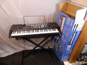 Casio Keyboard with Box and Stand