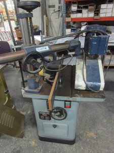 lot 102 image: DELTA WOOD SHAPER WITH POWER FEED