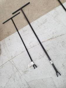 lot 194 image: Lot of (2) New Street Key-Rebar 58in. Diameter Rod 36in. Length, Street Key-Rebar 12in. Diameter 28in. Length