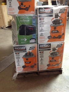 Pallet of assorted hardware tools , Dum Cart,Tile saw, Vacuums , and more original customer returns