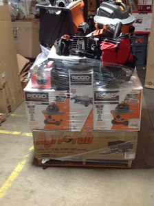 Pallet of assorted hardware tools , Dump Cart,Tile saw, Vacuums , and more original customer returns