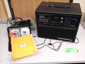 lot 106 image: VocoPro Digital Key Control CDCD Graphics System Colt, CD Music Catalog, Wired Microphone, Remote Control