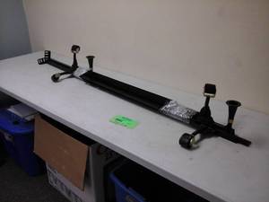 lot 213 image: Twin Size Rolling Metal Bed Frame