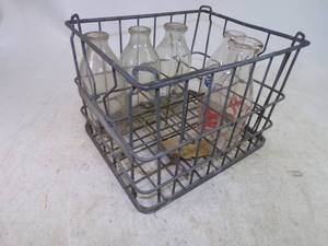 lot 60 image: Milk Crate with 4 Milk Bottles