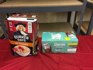 lot 500 image: Owyn Chocolate Dairy Free Beverage & Quaker Oats Old Fashioned Oats, Retail $16.42