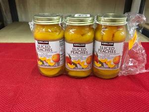 lot 505 image: Kirkland Signature Sliced Peaches, Retail $9.99