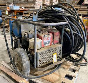 lot 72 image: Gas Powered Walk-Behind Concrete Saw
