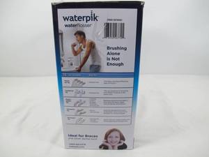 lot 48 image: Waterpik Ultra Plus Water Flosser, Nano Flosser,  Travel Case, Storage Case and 12 Accessory Tips