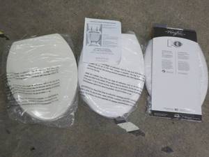 lot 114 image: 3 Elongated Toilet Seats...