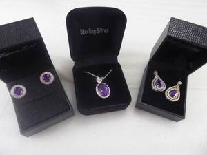 lot 94 image: Brand New Womens 5 Piece Platinum Plated Amethyst Pendant and Earrings Lot