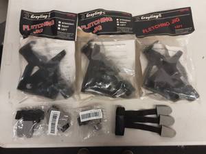 lot 18 image: 3-Fletching Jigs (Left, Right & Straight) & 3-Finger Tip Protectors