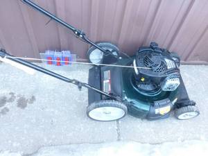 Bolens 21 push mower. Smokes when first started but clears up after running awhile. As shown.