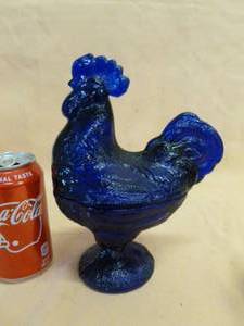 Rooster On Nest