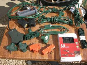 lot 52 image: Group Household Extension Cords and Adapters