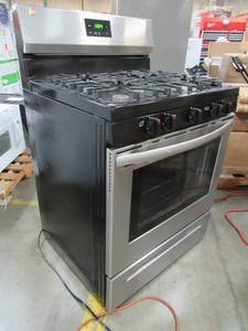 lot 287 image: Frigidaire 5 Burners 5-cu ft Freestanding Gas Range (EasyCare Stainless Steel) FCRG305LAF - Missing center burner and burner caps, inside door glass is shattered.
