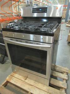 lot 288 image: Samsung 30 in. 5.8 cu. ft. Gas Range with Self-Cleaning and Fan Convection Oven in Stainless Steel NX58H5600SS - Missing Knobs and 1 Rack, Maybe Slightly Used or Sitting somewhere for awhile.