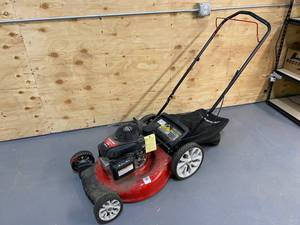 lot 28 image: Troy-Bilt 21 in. 160 cc Honda Gas Walk Behind Push Mower with High Rear Wheels and 3-in-1 Cutting TriAction Cutting System