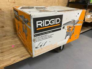 lot 1 image: Ridgid Model R4512 13 Amp 10 in. Professional Cast Iron Table Saw