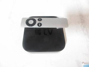 lot 17 image: Apple TV with remote