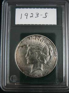 lot 49 image: 1923s Peace Silver Dollar