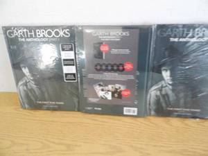 lot 106 image: Lot of 3 Garth Brooks Books  CD Sets