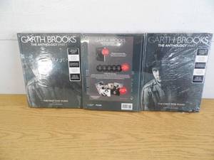 lot 107 image: Lot of 3 Garth Brooks Books  CD Sets