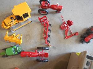 Toy Tractors and Vintage Glass Bottles