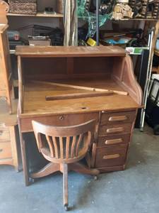 lot 5 image: Antique Oak Desk (Needs Repair) & Chair On Casters.  42x30x45
