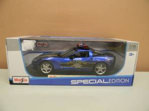 lot 7 image: MAISTO 118 SCALE SPECIAL EDITION 2005 CHEVROLET CORVETTE COUPE POLICE CAR - NEW IN BOX - SEE PICTURES