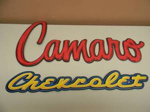 lot 11 image: OPEN ROADS GM LICENSED PRODUCTS CHEVROLET & CAMARO SIGNS - APPROX 28 & 24 - LIKE NEW - SEE PICTURES