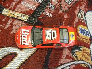 lot 15 image: REVELL-MONOGRAM 118 SCALE BUD 50TH ANNIVERSARY NASCAR DIE CAST CAR - NICE - & BUD, CHEVY DALE EARNHARDT JR. TAPESTRY - APPROX 48 BY 60 - NICE - SEE PICTURES PICTURES