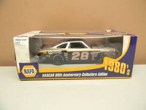 lot 29 image: BUDDY BAKER GRAY GHOST NASCAR 50th ANNIVERSARY 124 NAPA ACTION 1980 #28 - NEW IN BOX - SEE PICTURES