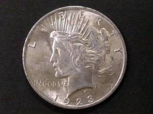 1923 AU Peace Silver Dollar...