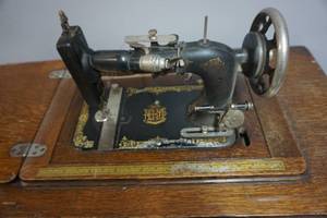 New Home Vintage Treadle Sewing Machine With Cabinet