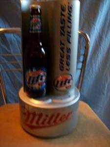 2004 Miller Lite Genuine Draft rotating sign. New in box. As shown.
