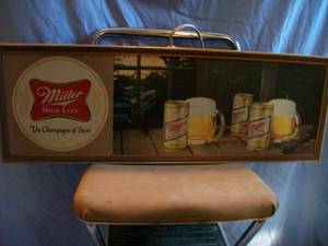 Miller High Life light. Approx. 27 x 9. Plastic face metal can. As shown.