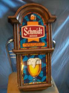 Schmidt Vacu-form sign. Has a few dmaged spots as shown. Approx. 23 x 12. As shown.