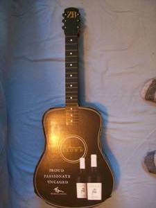 Zack Brown Wine cardboard store display guitar that is double sided. Approx. 39 x 16. As shown.