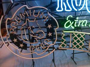 Rolling Rock Neon Sign. Approx. 42 x 44. Upper neon works but lower has broken tube. As shown.