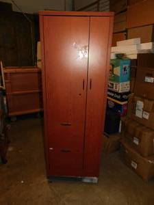 lot 9 image: Tall wooden closet
