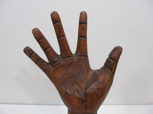lot 279 image: Hand Carved Wooden Ring Display Hand