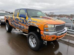 lot 10 image: 2003 GMC Sierra 1500 4x4 Custom Paint Job