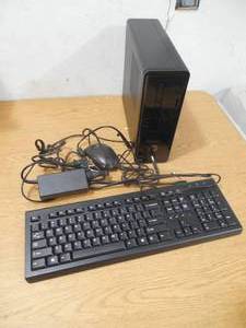 lot 60 image: HP Slimline AMD A4 4GB Memory 1TB Hard Drive Windows 10 Tower Desktop Computer - Dark Black,