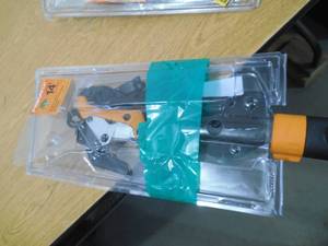 lot 176 image: Fiskars PowerLever 1-18 in. Cut Capacity Steel Saw Blade 15 in. Fiberglass Pole 14 ft. Tree Pruner