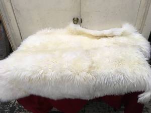 lot 186 image: Sheepskin Quad Rug Ivory, Retail $109.99