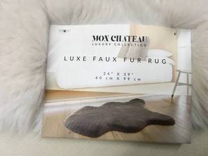 lot 212 image: Mon Chateau Luxe Fur Rug 24 x 39, Retail $19.99