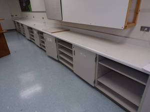 lot 3 image: 24 Counter top with cabinets and shelves
