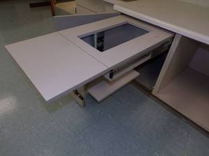 lot 33 image: Fold a way Sewing machine Under counter slide out