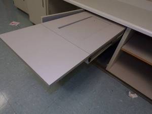 lot 34 image: Fold a way Sewing machine Under counter slide out