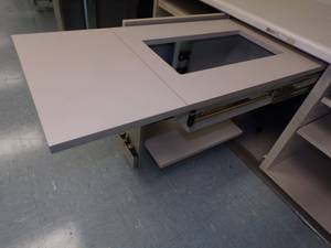 lot 37 image: Fold a way Sewing machine Under counter slide out